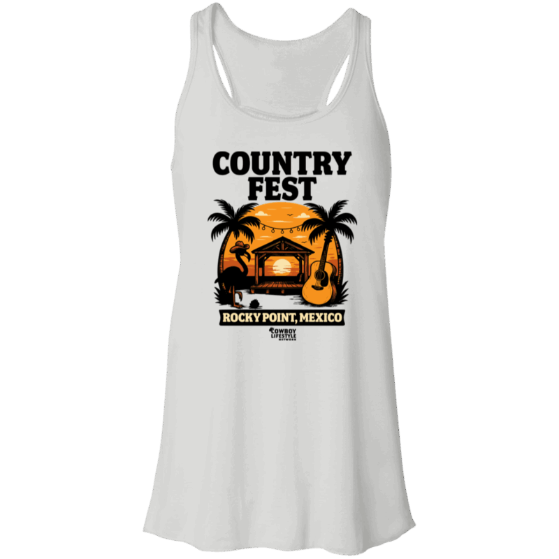 White tank top featuring a sunset design with palm trees, flamingo, guitar, and a beachside stage with the text "Country Fest Rocky Point, Mexico"